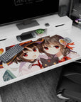 Megumin and Yunyun from Konosuba anime on 40x20 inches desk pad, featuring chibi Chomusuke and chaotic school day theme.