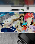 40x20 inches anime desk pad in warm oranges and icy blues, cozy winter vibe with magic splash accents.