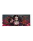 Nezuko anime mouse pad 28x12 inches with blazing design, featuring her intense pink eyes and dynamic hair in motion.