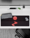 Serene 32x12 mouse pad with a glowing red sun, mountain shadows, and calm waters for a tranquil, calming atmosphere at your desk