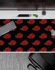 Deep charcoal black anime desk pad 40x20 inches with crisp red Akatsuki clouds, bold moody vibe.