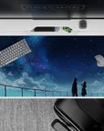 Indigo and cool blue anime desk pad, 40x20 inches, calm dreamy night sky with stars and misty clouds.