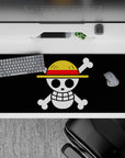 36x16 inches desk pad with the Straw Hat Jolly Roger from One Piece, symbolizing the pirate legend and spirit of adventure.