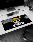 Modern 32x16 inches mouse pad with the Straw Hat Jolly Roger from One Piece, representing the strength and adventure of Luffy's crew.