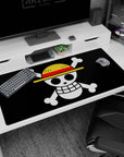 Large 40x20 inches desk pad featuring the Straw Hat Jolly Roger from One Piece, representing the spirit of adventure and pirate legend.