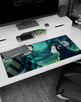 Tanjiro and Nezuko scene desk pad, 36x16 inches, with glowing blues and greens, fireflies, and anime warmth.