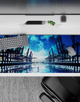 Anime desk pad 36x16 inches in deep ocean blues and icy cyan, calm cinematic night horizon.