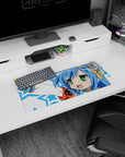 28x12 inches Lucky Star Konata Izumi mouse pad, green eyes and cheeky grin in a victory pose.