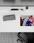 Cozy late-night vibe anime girl mouse pad 14x10 inches in pink, navy, black tights on pale sheets.