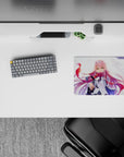 Bold 14x10 mouse pad with Zero Two’s fierce emerald eyes, flowing pink hair, and windswept background for a dynamic look