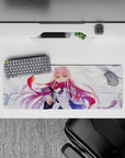 Zero Two 32x12 mouse pad with dynamic windswept background, fierce emerald eyes, and flowing pink hair for bold style