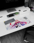 Zero Two 28x12 mouse pad capturing fierce emerald eyes, flowing pink hair, and windswept background for bold design