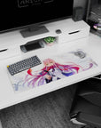 Elegant 32x12 mouse pad capturing Zero Two’s fierce emerald eyes, flowing pink hair, and dynamic windswept background