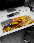 Golden armored knight grinning with raised gauntlet and blazing fireball on anime desk pad 36x16 inches.