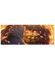 Anime mouse pad 32x12 inches featuring Tanjiro Kamado in a fiery strike from Demon Slayer, vibrant orange and blue hues.
