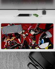 Anime mouse pad 32x16 inches featuring Persona 5's Joker, Panther, and Mona mid-heist, vibrant reds and blacks.