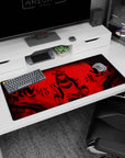 36x16 inches anime desk pad showing a calm masked samurai, hand near sword amid black ink flames.