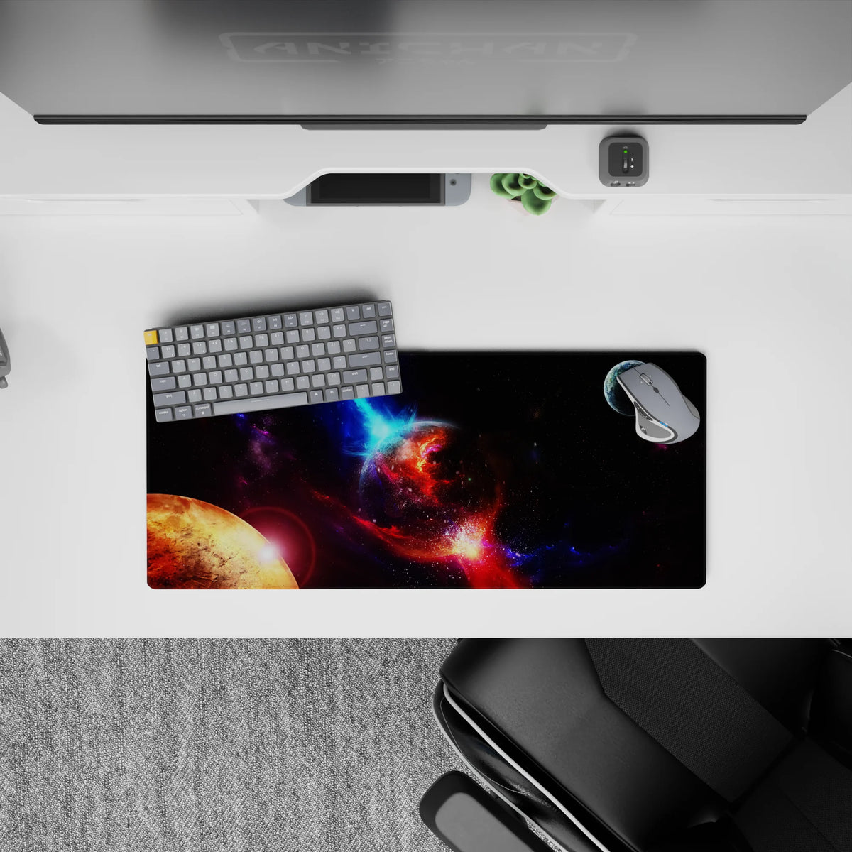 Cinematic galaxy mouse pad 28x12 inches in inky black, violet dust glow, and electric blue highlights.