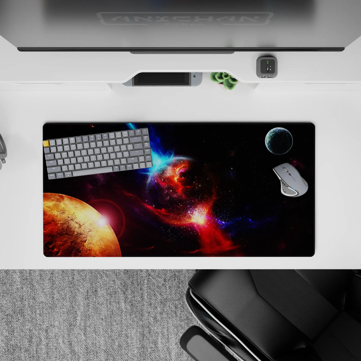 Cinematic space mouse pad 32x16 inches in inky black, violet dust, and electric blue nebula glow.