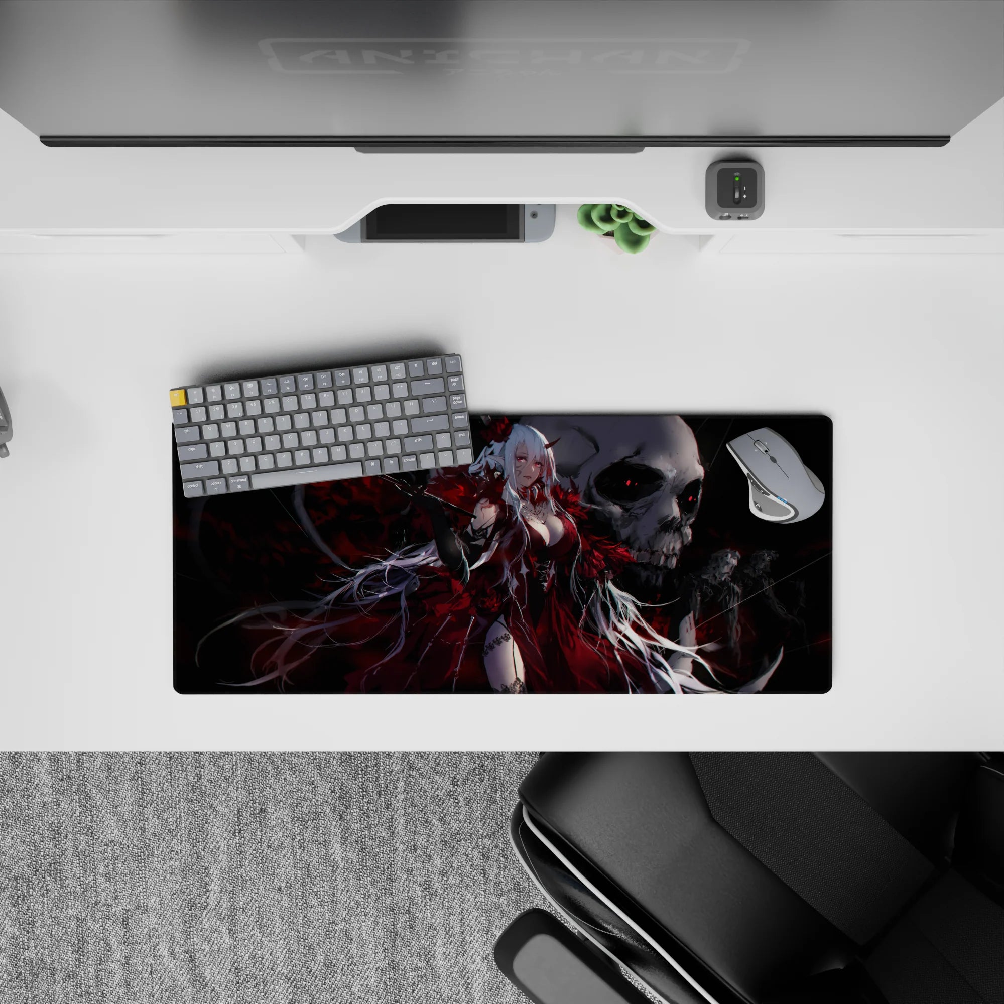 28x12 inches gothic anime desk mat in crimson red, smoky black, and silver hair with skull backdrop.