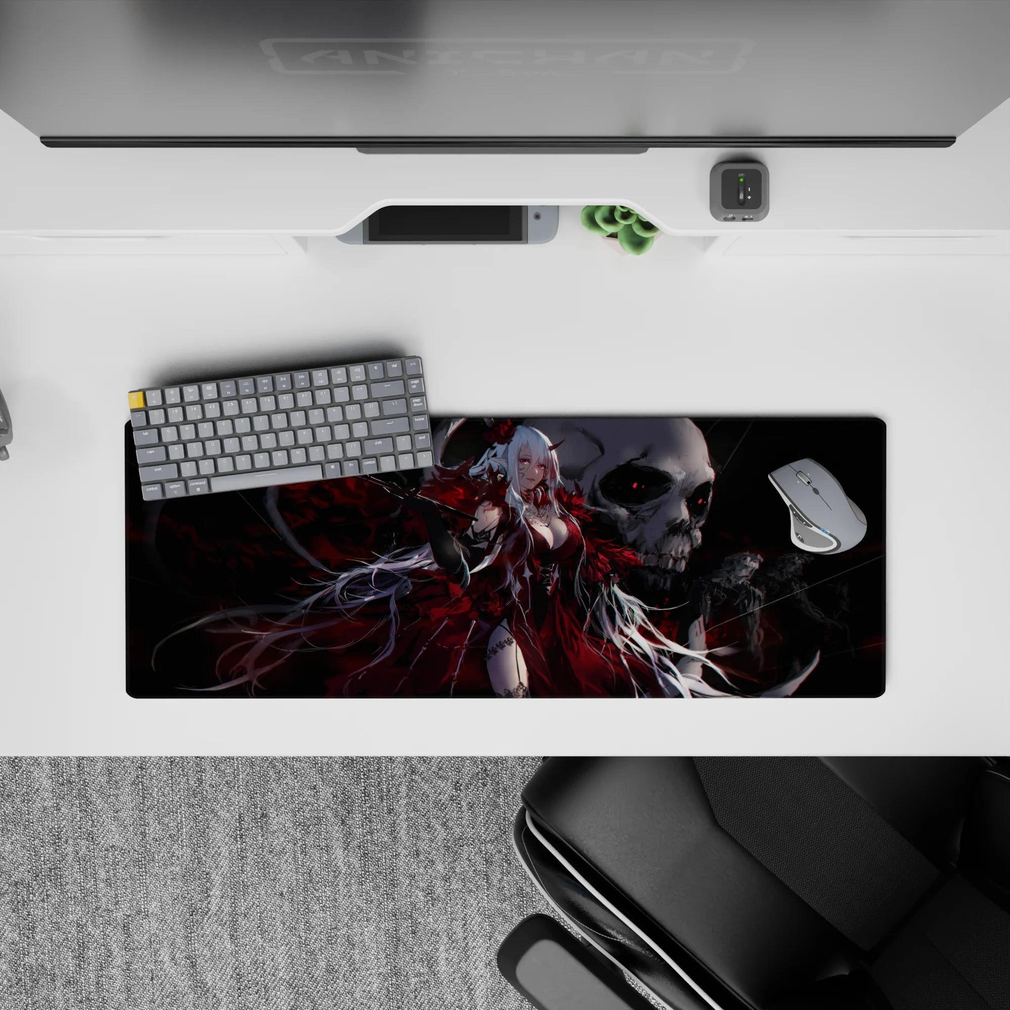 Gothic crimson anime desk mat 32x12 inches in smoky black and silver with skull backdrop, dramatic vibe.