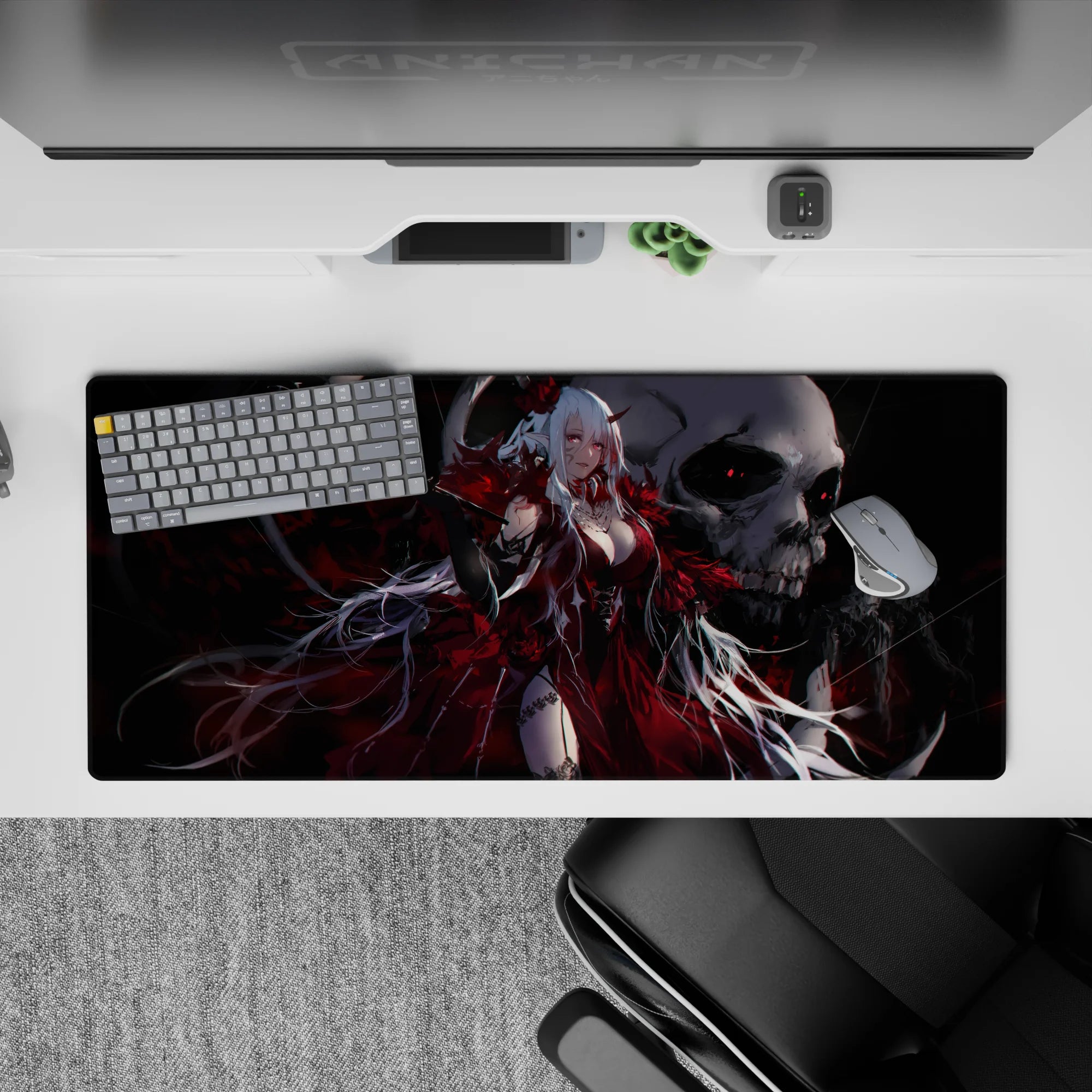 36x16 inches gothic anime desk pad in crimson red, smoky black, and silver, with skull backdrop mood.