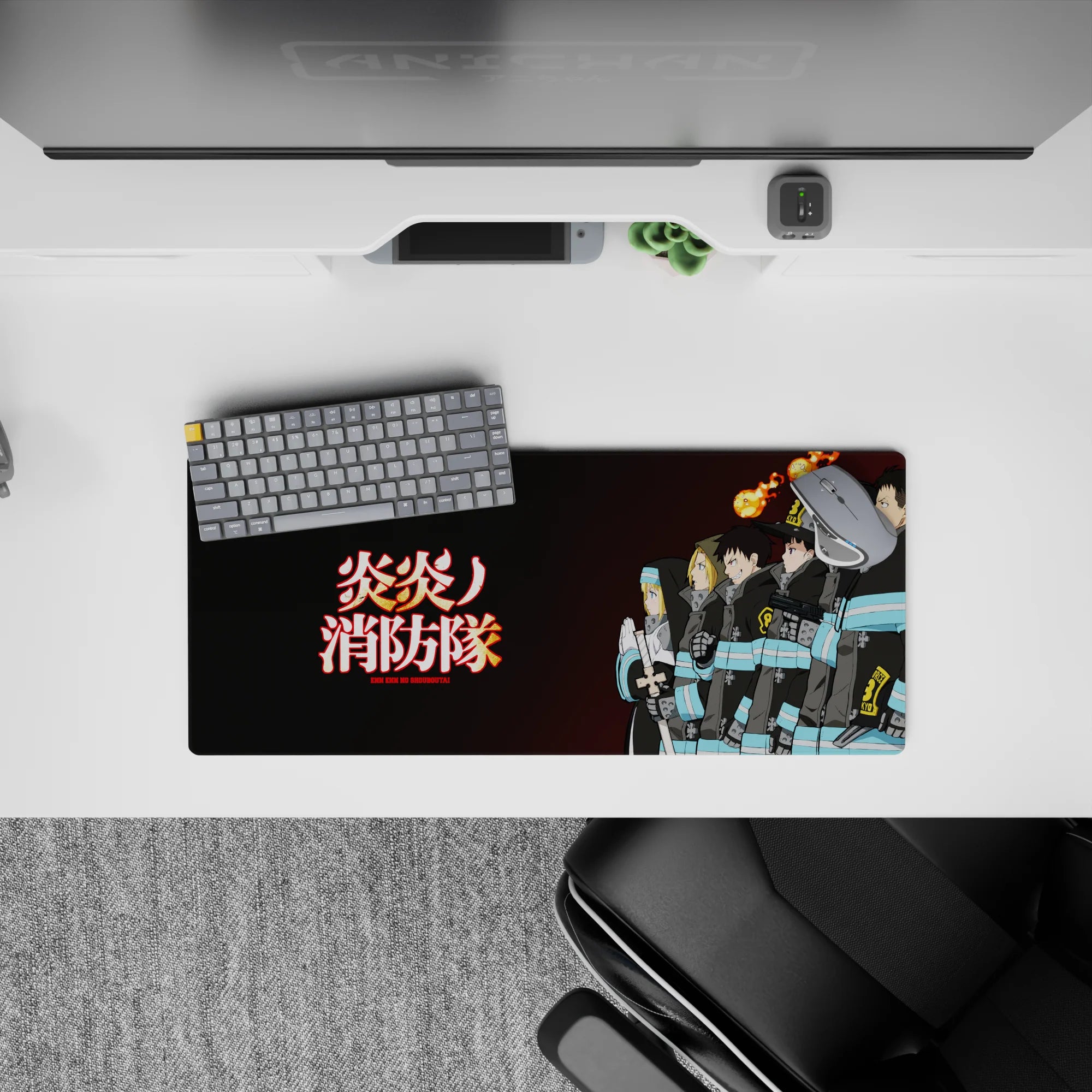 Charcoal Fire Force anime mouse pad 28x12 inches, turquoise bands and orange flame spirits, calm mood.