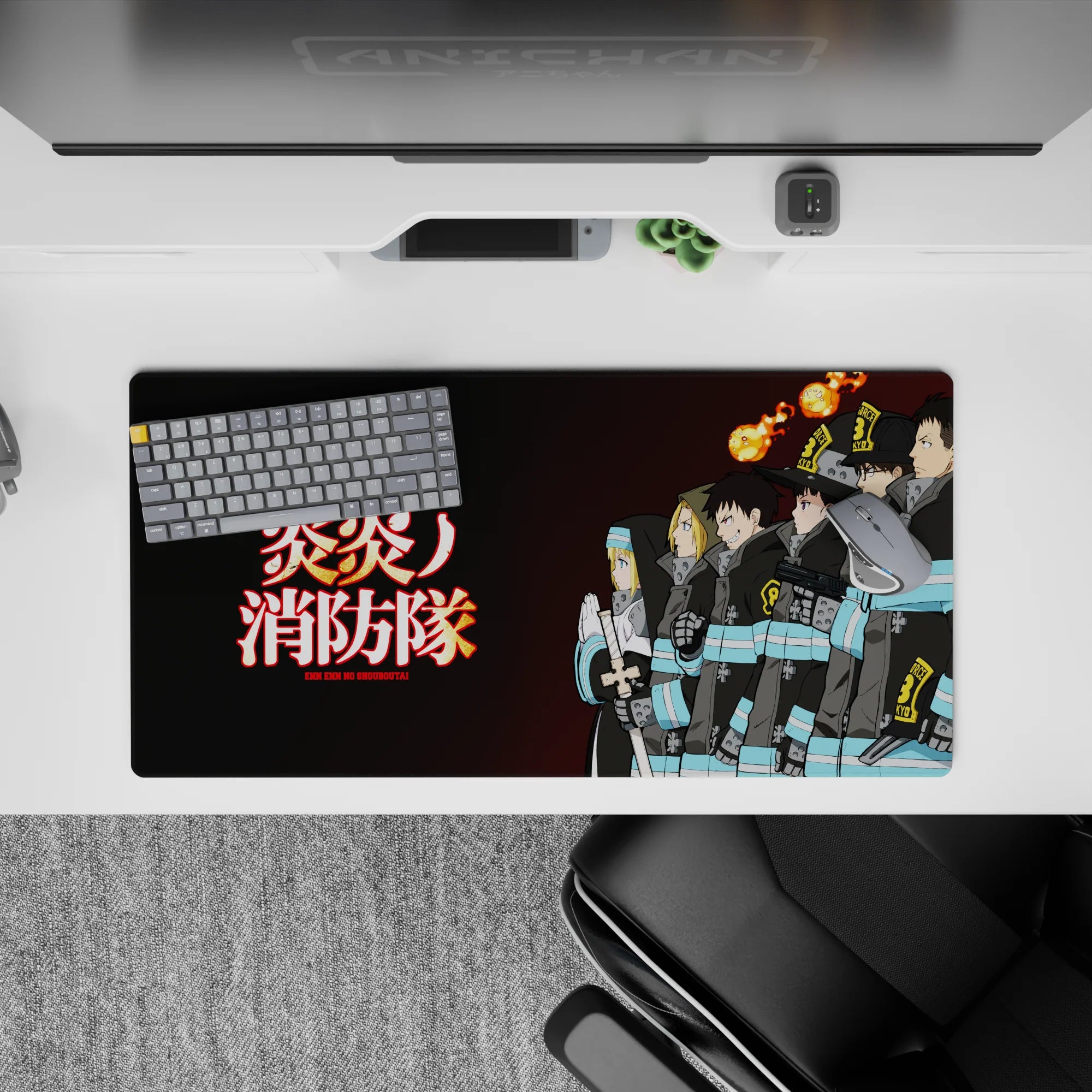 Dark charcoal Fire Force anime mouse pad 32x16 inches with turquoise bands and glowing fiery kanji.