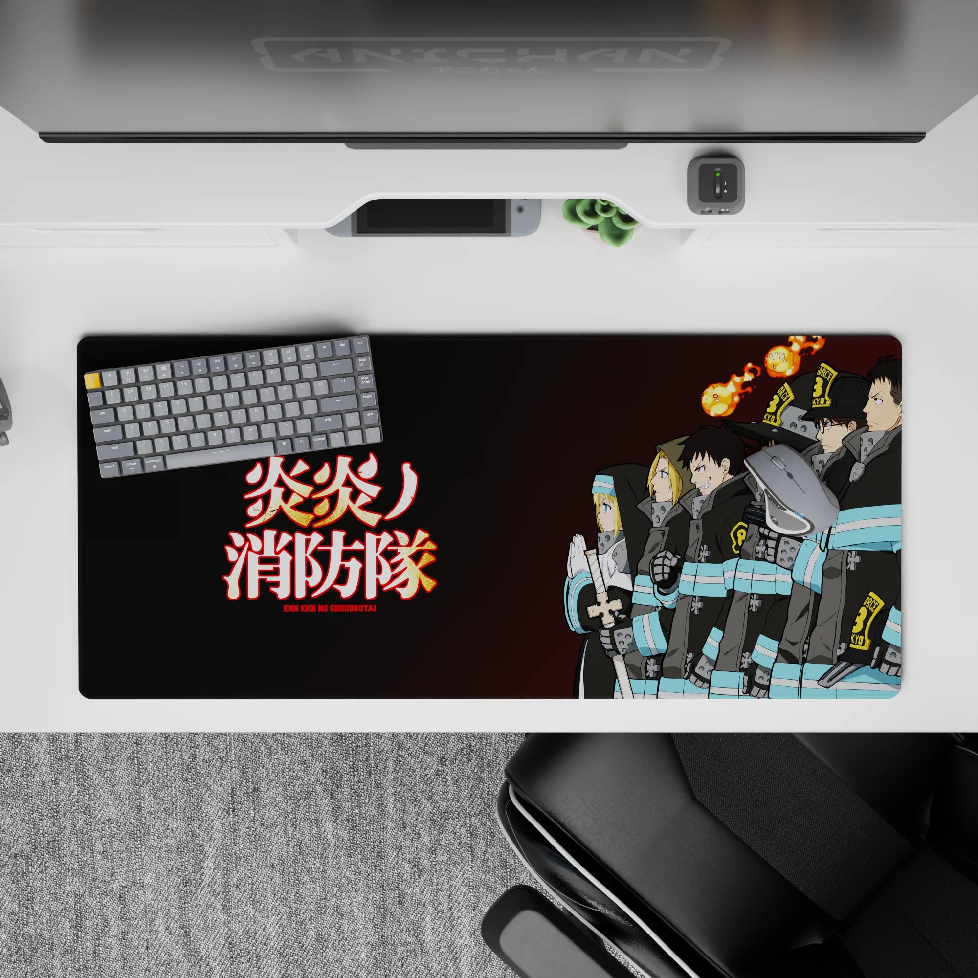 36x16 inches anime desk pad in deep charcoal with turquoise bands, glowing kanji, warm flame spirits.