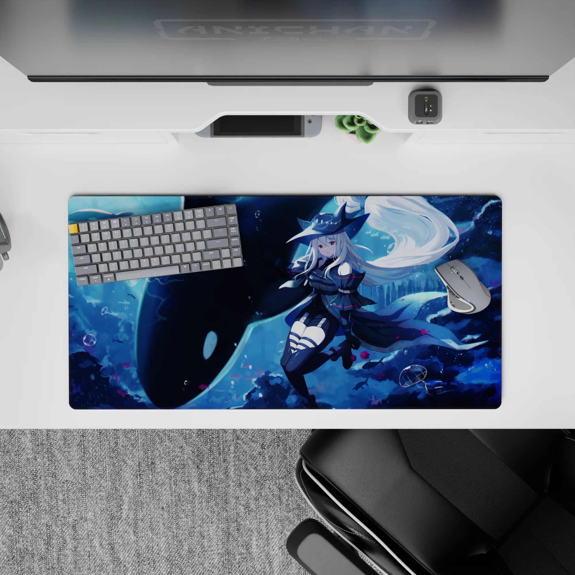 32x16 inches anime desk mat in deep blues with icy glow, bubbles, pink petals, dreamy ocean mood.
