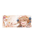 Anime girl mouse pad 28x12 inches with winking cat-eared girl, blue bow, and cheering kitten pal.