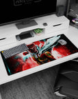 36x16 inches anime desk pad showing Saitama surging forward, cape whipping, calm face before impact.