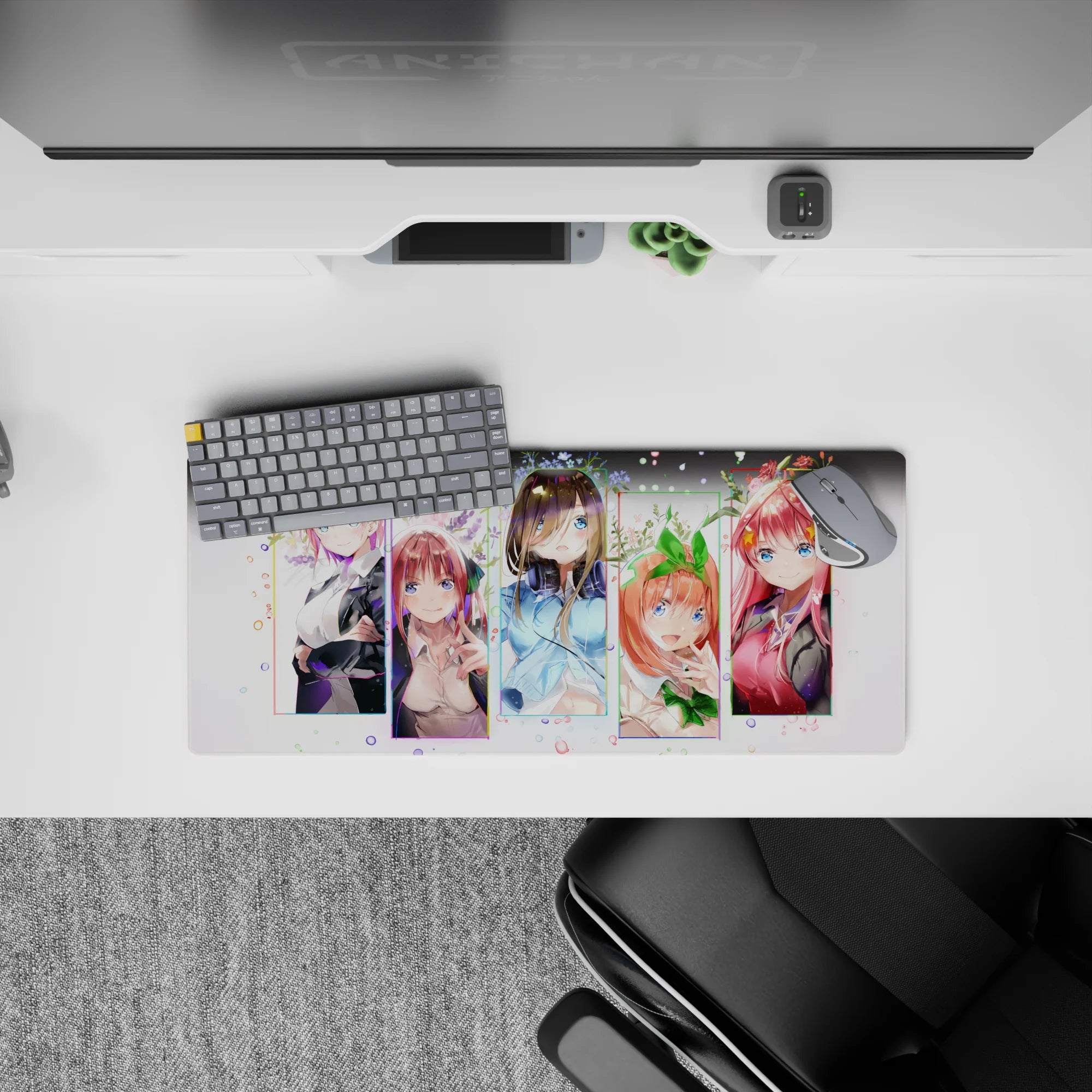Cute pastel anime girl mouse pad 28x12 inches in soft pink, mint, and blue with confetti and florals.