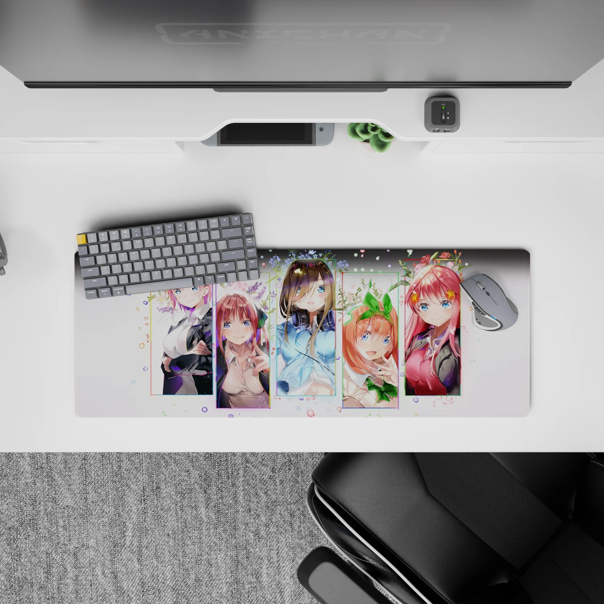 Cute pastel anime desk mat in pink, mint, and blue with confetti dots and tiny florals, 32x12 inches.