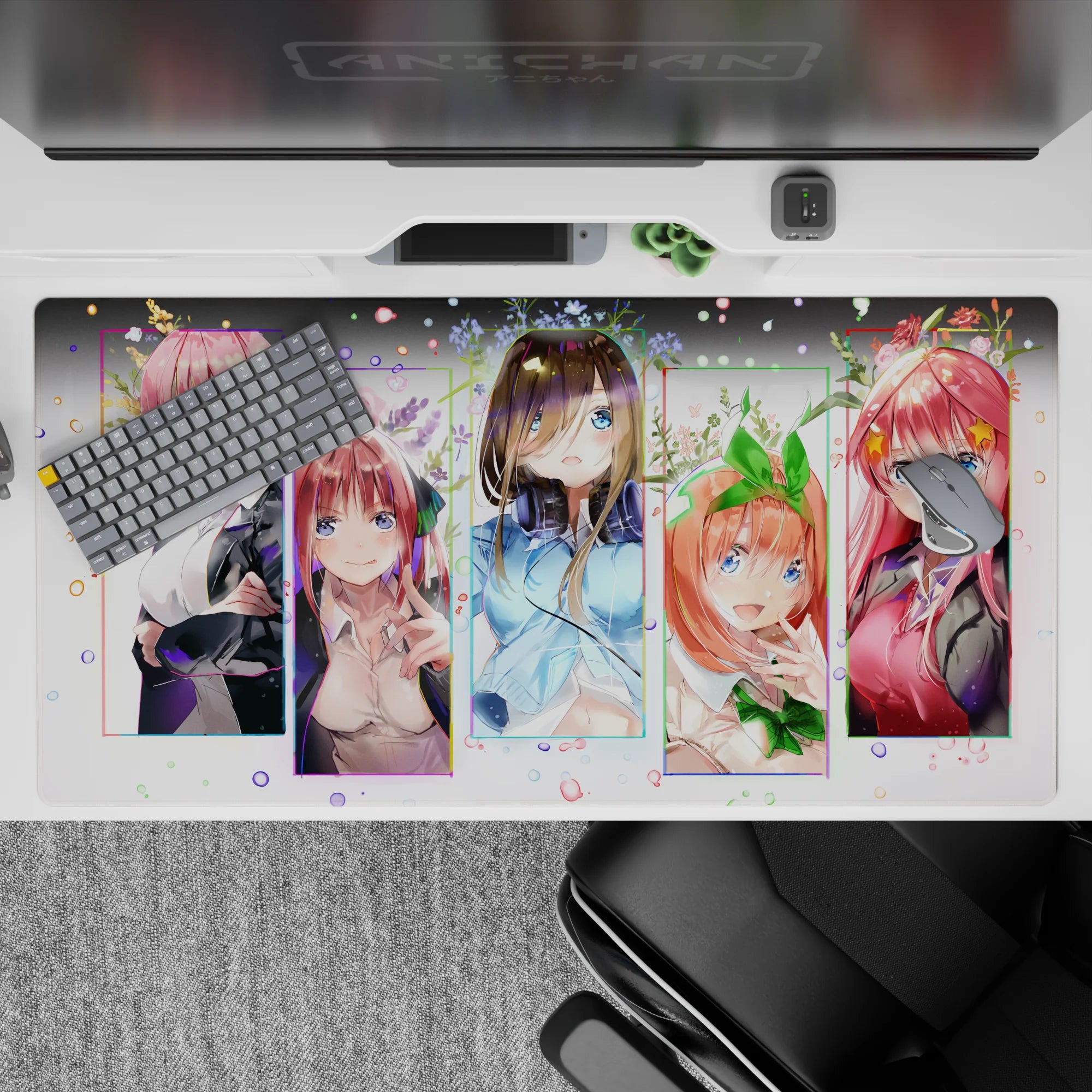 Pastel pink, mint, and blue anime girl desk pad with confetti dots and tiny florals, 40x20 inches.