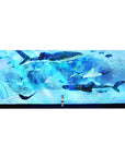 Anime girl ocean desk pad with whale sharks, star-speckled patterns and tiny fish, 36x16 inches.