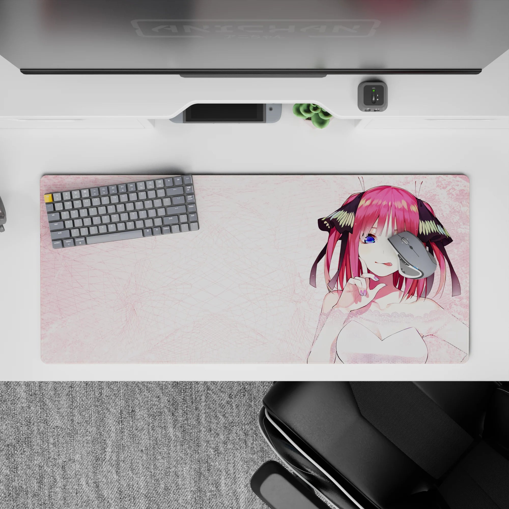36x16 inches kawaii desk pad in soft pink with bright magenta hair and ocean-blue eyes, cozy romance vibe.