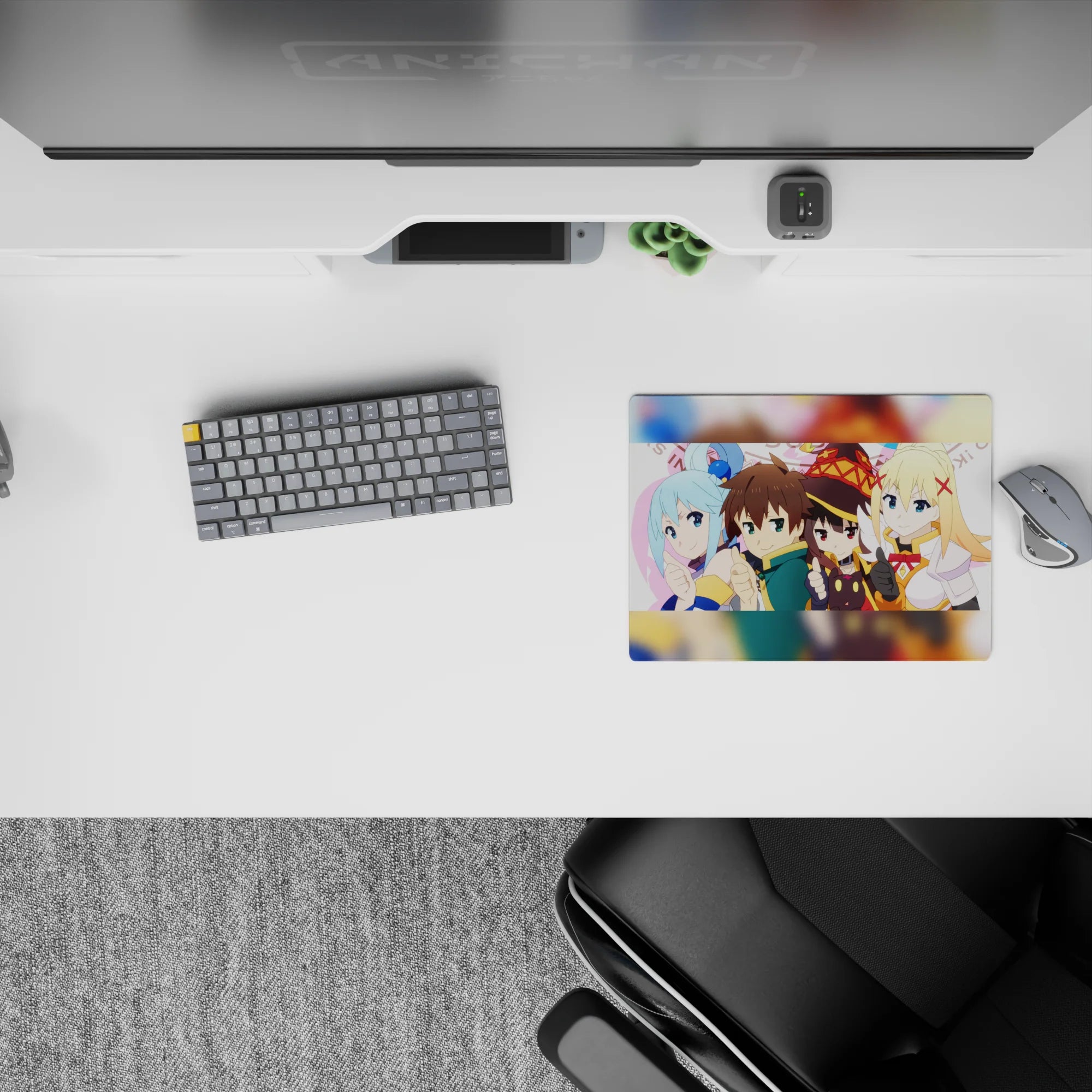 Kazuma and KonoSuba crew on 14x10 inch anime mouse pad, chibi-style with Aqua, Megumin, and Darkness, vibrant and fun.