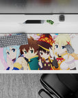 Kazuma and KonoSuba crew chibi anime desk pad, 36x16 inches. Features Aqua, Megumin, and Darkness in vibrant, fun design.