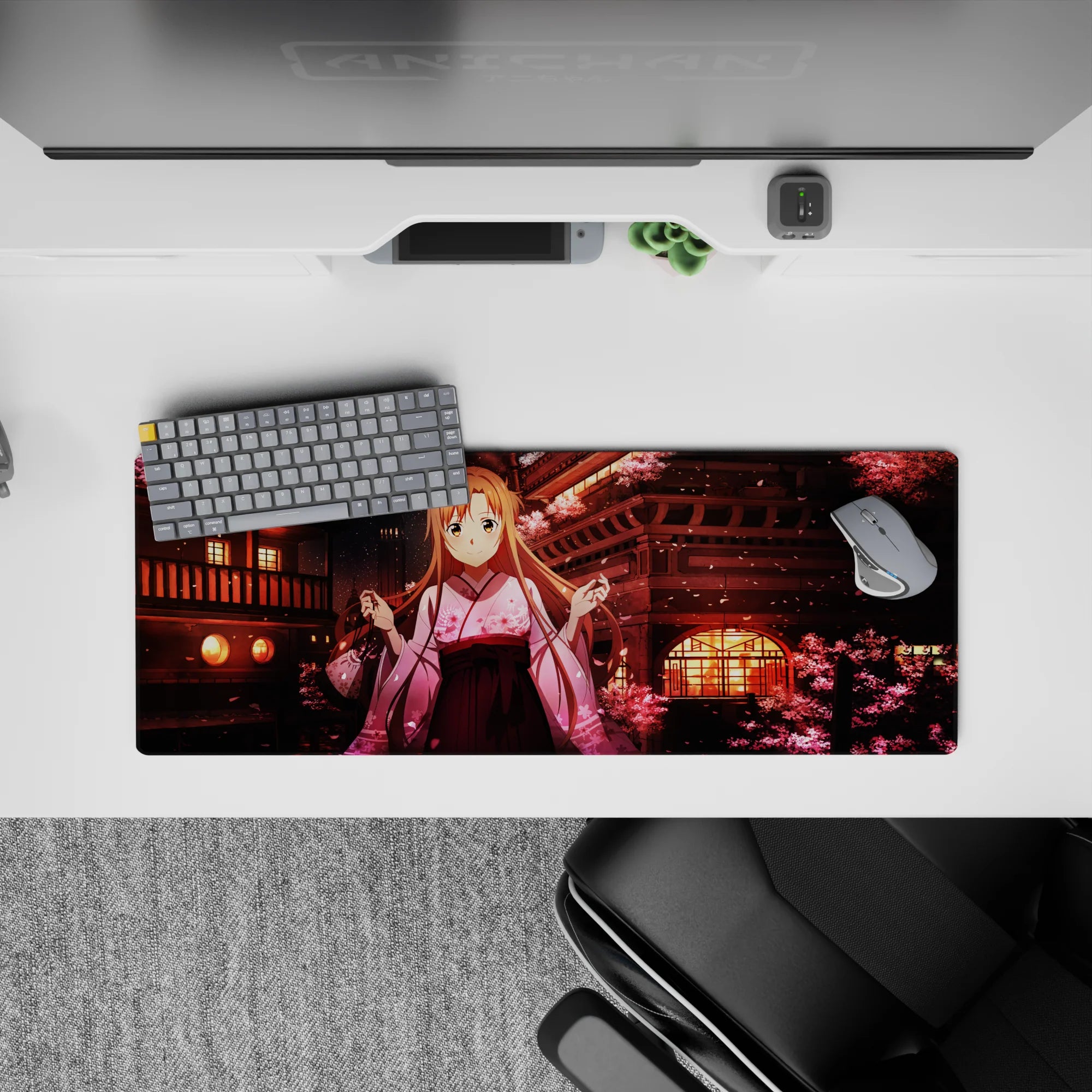 Anime mouse pad 32x12 inches featuring Asuna from Sword Art Online under sakura trees, with lantern-lit rooftops and pink blossoms.