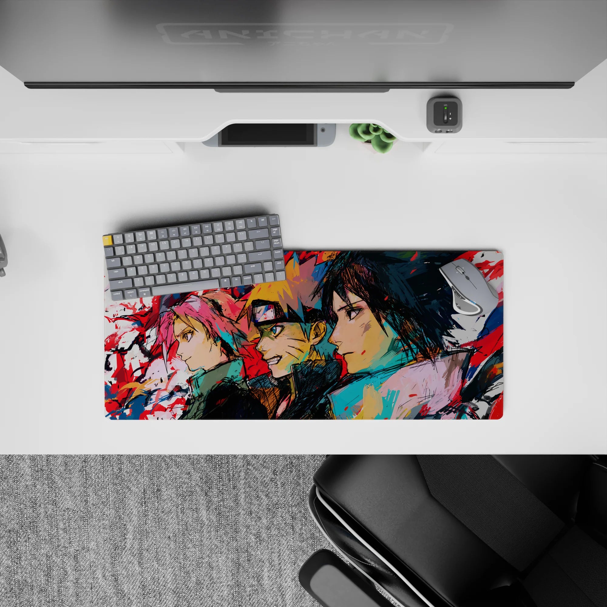 Naruto anime mouse pad 28x12 inches featuring Team 7—Sakura, Naruto, Sasuke—in bold sketch-art with vibrant colors.