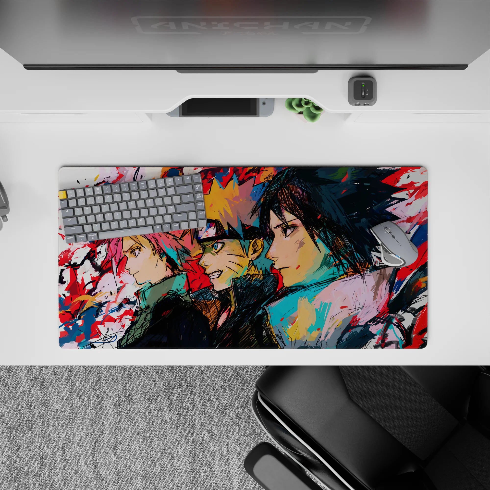Anime mouse pad 32x16 inches featuring Team 7—Sakura, Naruto, and Sasuke—in bold sketch-art with vibrant colors and textures.