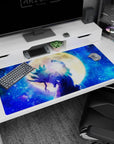 40x20 inches anime desk pad showing a bandaged fighter punching the sky, teal flame hair, golden moon.