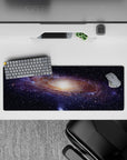 Calming deep navy and smoky blue mouse pad, 32x12 inches, with beige and faint purple galaxy hues.