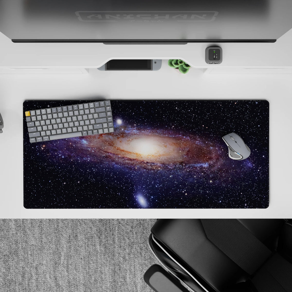 Calm, dreamy 36x16 inches desk pad in deep navy, smoky blue, beige and faint purple cosmic bands.