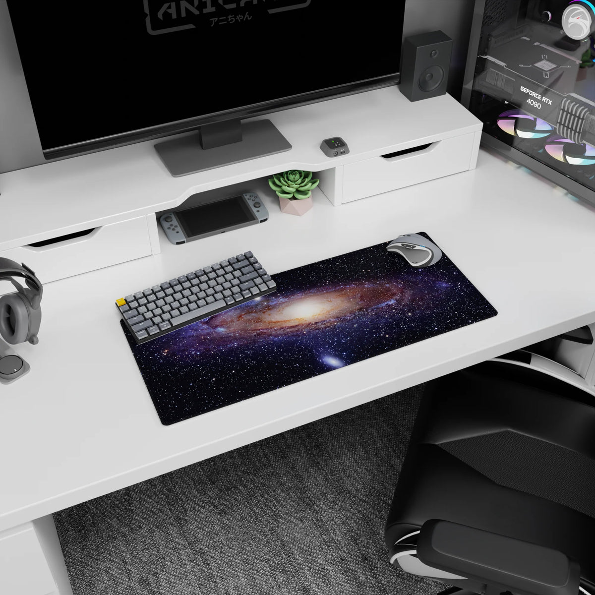 Night sky scene 28x12 inches mouse pad featuring tiny stars around a soft glowing galaxy core.
