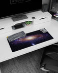Night sky scene 28x12 inches mouse pad featuring tiny stars around a soft glowing galaxy core.