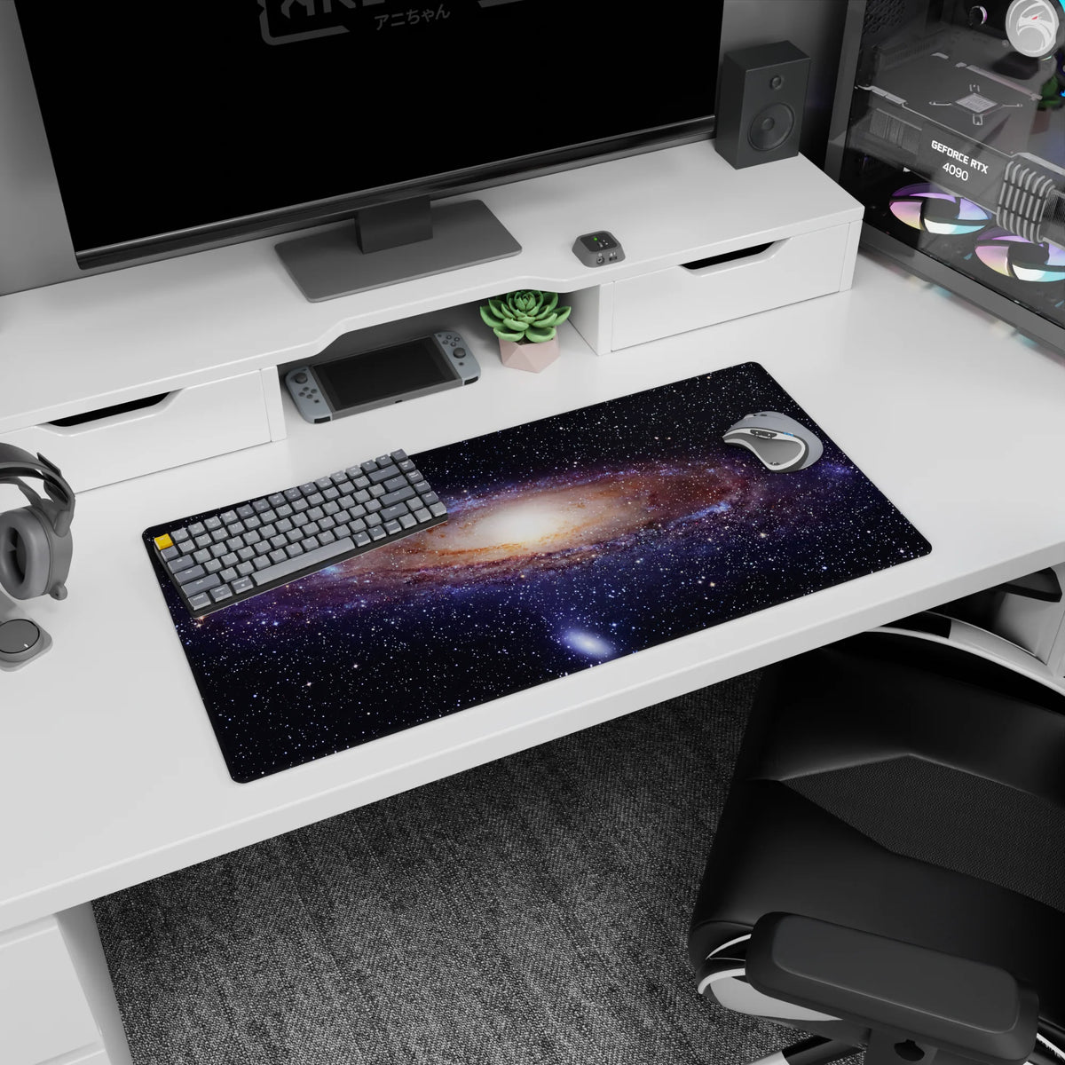 Night sky scene 32x16 inches mouse pad featuring a star-sprinkled galaxy spiral with a soft luminous center.