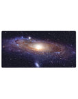 Galaxy swirl desk mouse pad 32x16 inches with tiny stars, ribbon-like bands, and a glowing core.