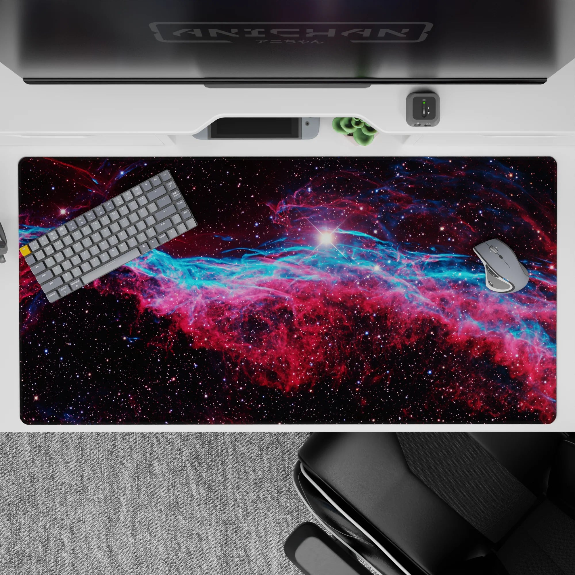 Cosmic mood desk pad 40x20 inches in neon teal, pink, and blue with dreamy starlight sparkle.